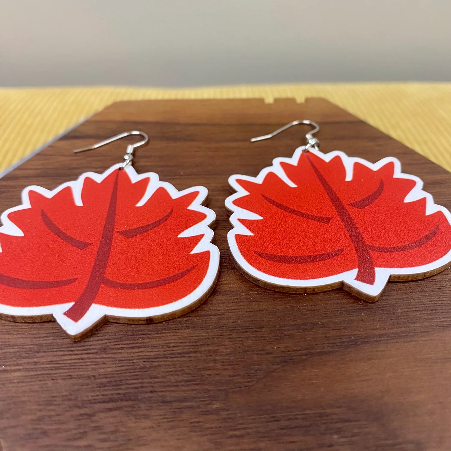 red fall leaf wooden drops