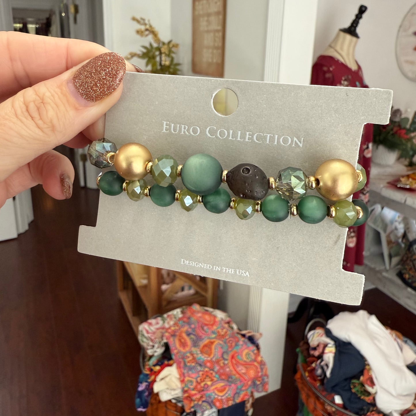 emerald stone stack with faceted crystals