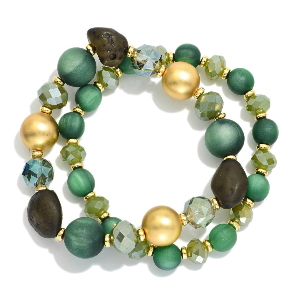 emerald stone stack with faceted crystals