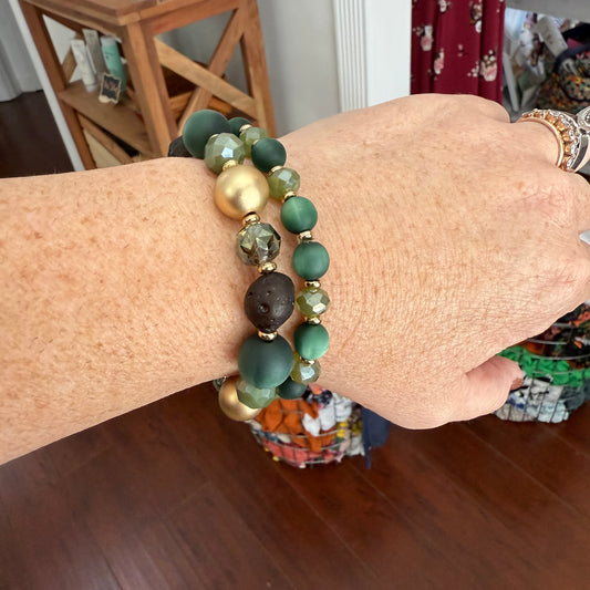 emerald stone stack with faceted crystals